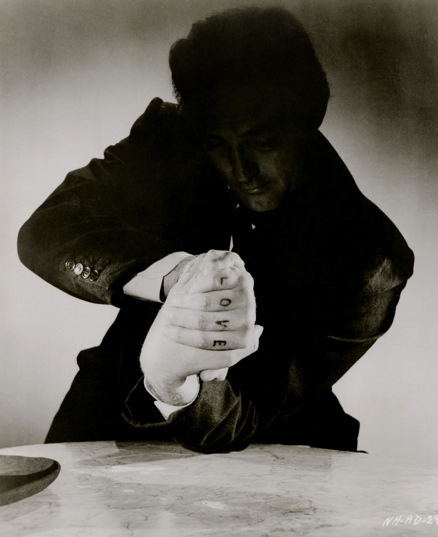 Anonymous - Robert Mitchum in The Night of the Hunter (1955).jpg