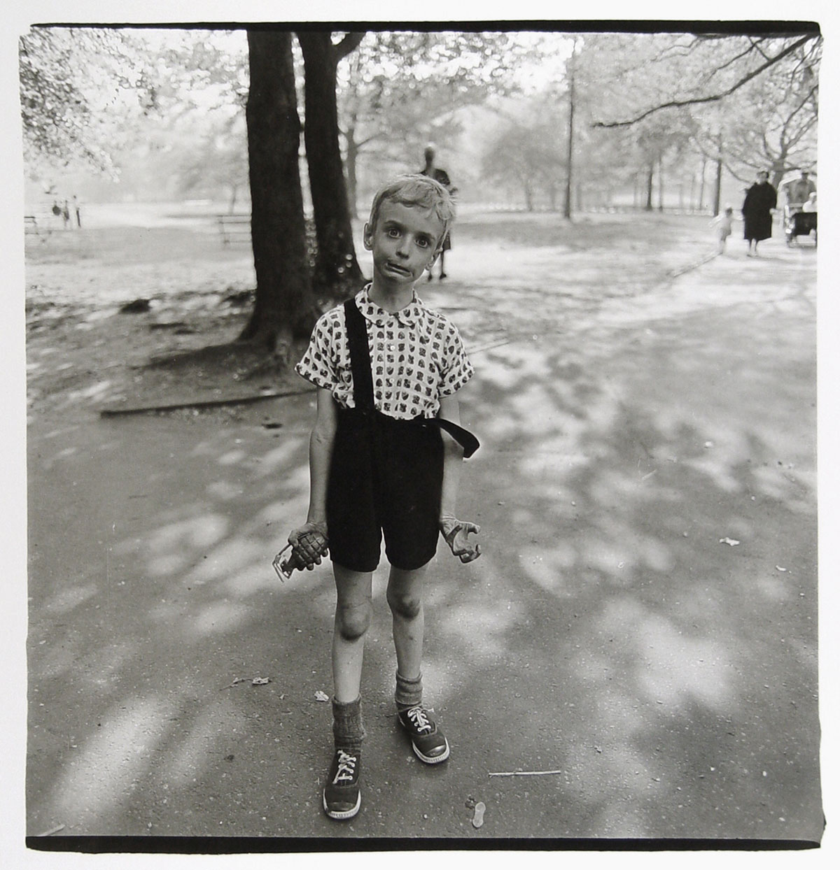 Diane Arbus -  Child with a toy hand grenade in Central Park, N.Y.C. 1962.jpg
