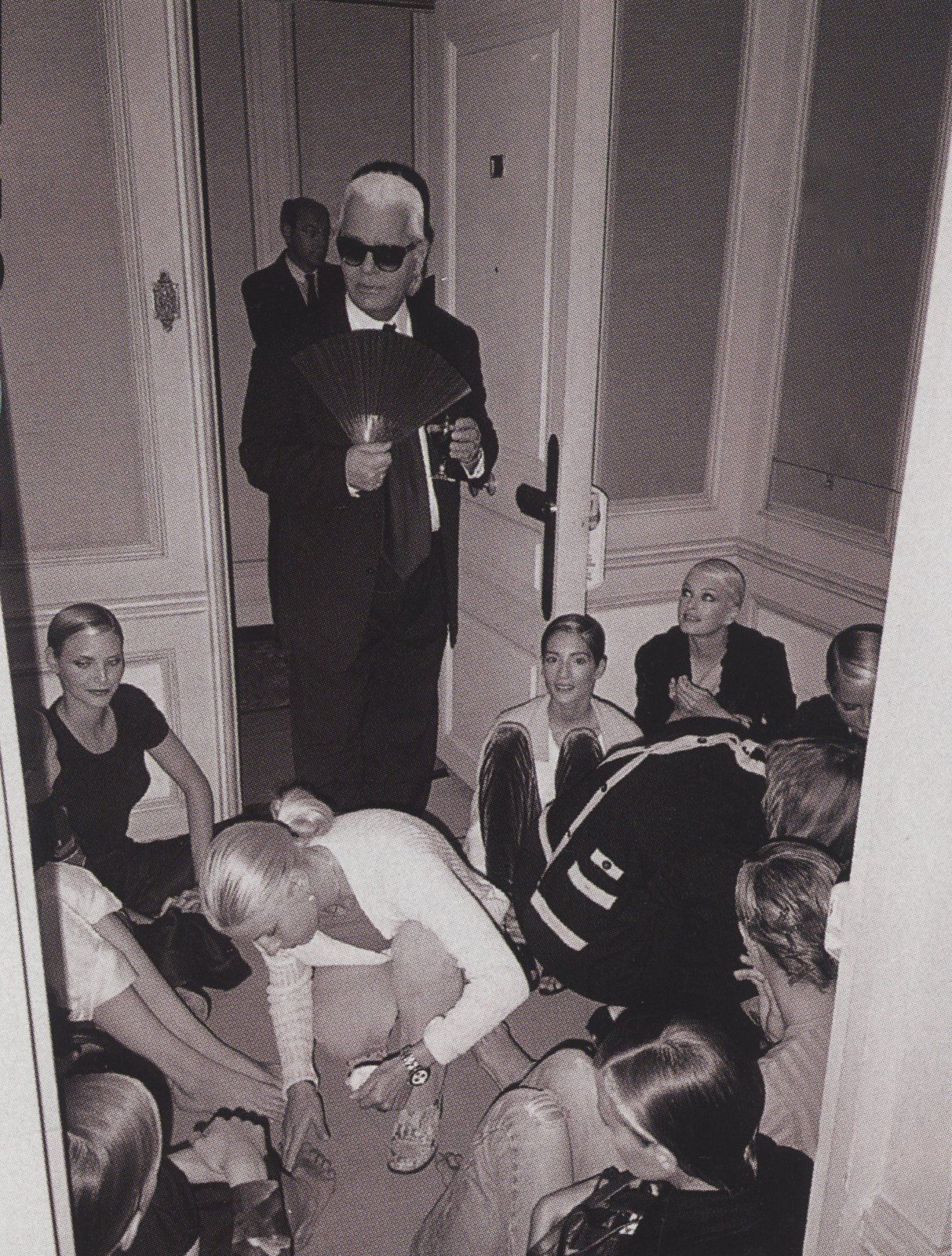 KARL LAGERFELD AND MODELS  BEHIND CLOSET DOORS AT CHANEL  HARPER'S BAZAAR  SEPTEMBER 1996.jpg