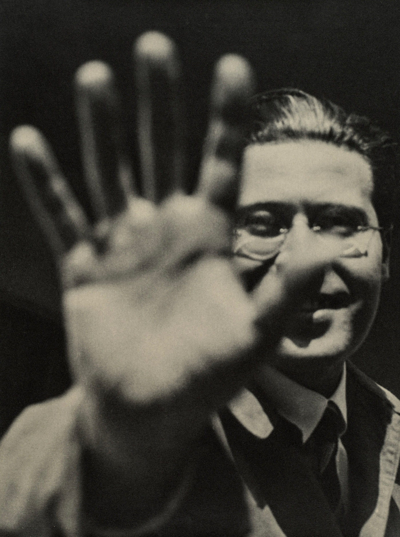 László Moholy-Nagy -- Self-Portrait with Hand (1925-29, printed 1940-49).jpg