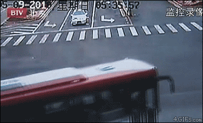 Lucky-bicyclist-close-call-crash.gif
