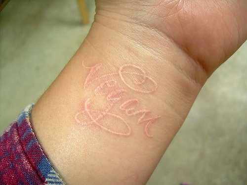 scarification-skin-tattoo-vegan-white-ink-wrist-image-55557.jpg