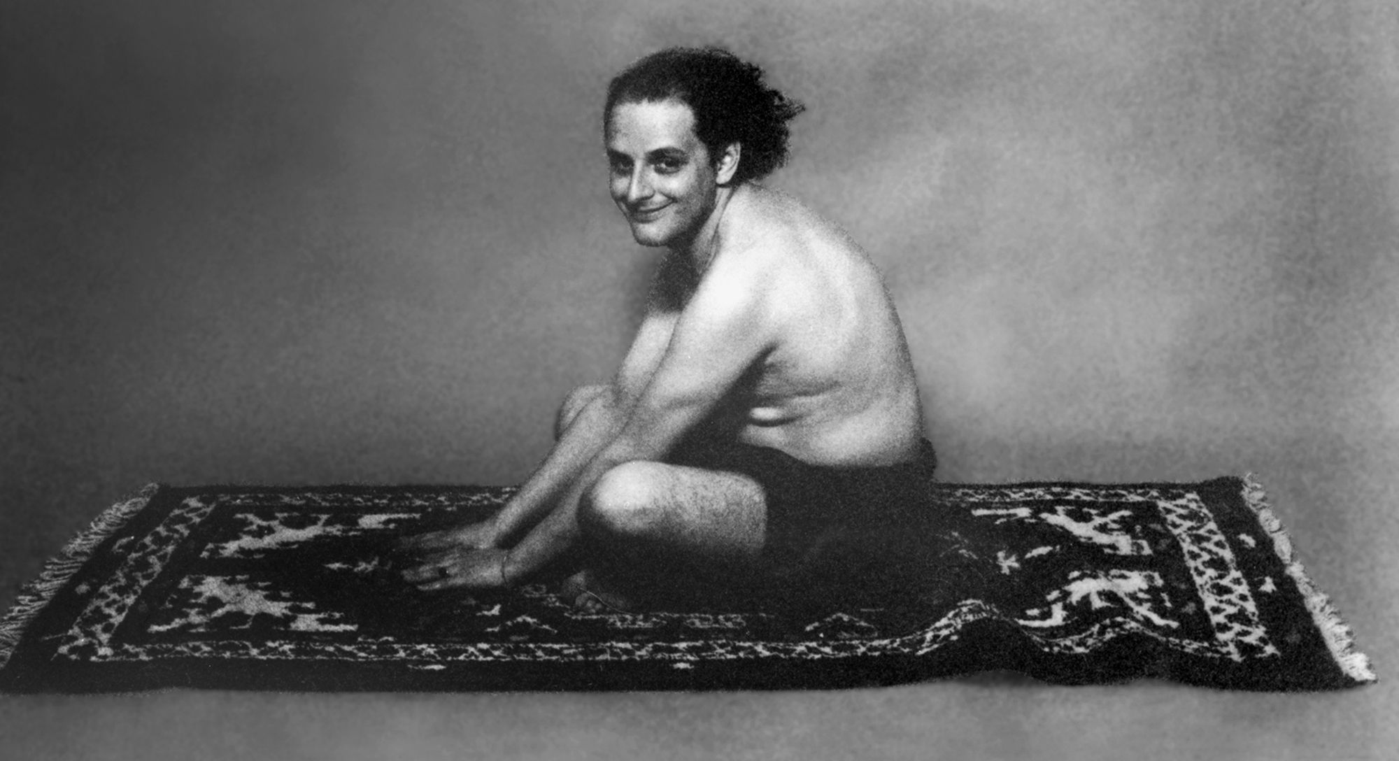 Urs Lüthi - Selfportrait (flying carpet) (1976).jpg
