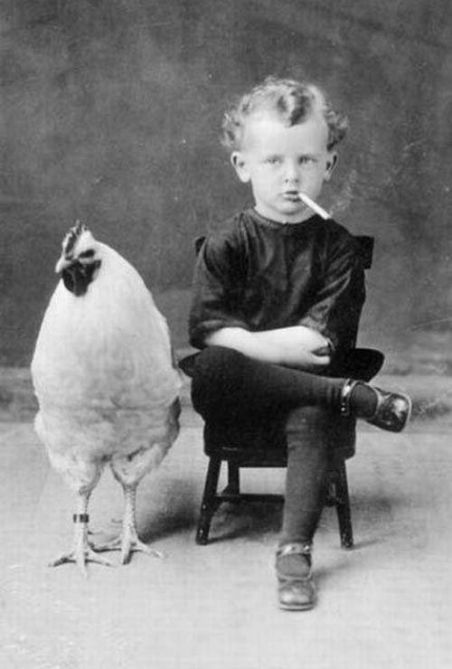 weird-Vintage-photos-kid-smoking-chicken.jpg