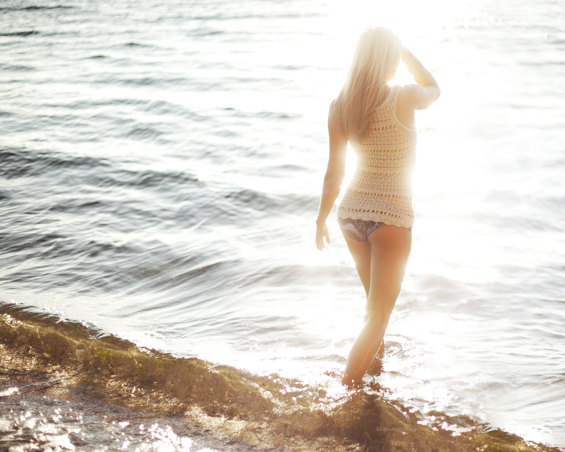 Blonde_Girl_on_the_Beach_faces_at_Sunset_-_Photo_by_Mike_Monaghan.png